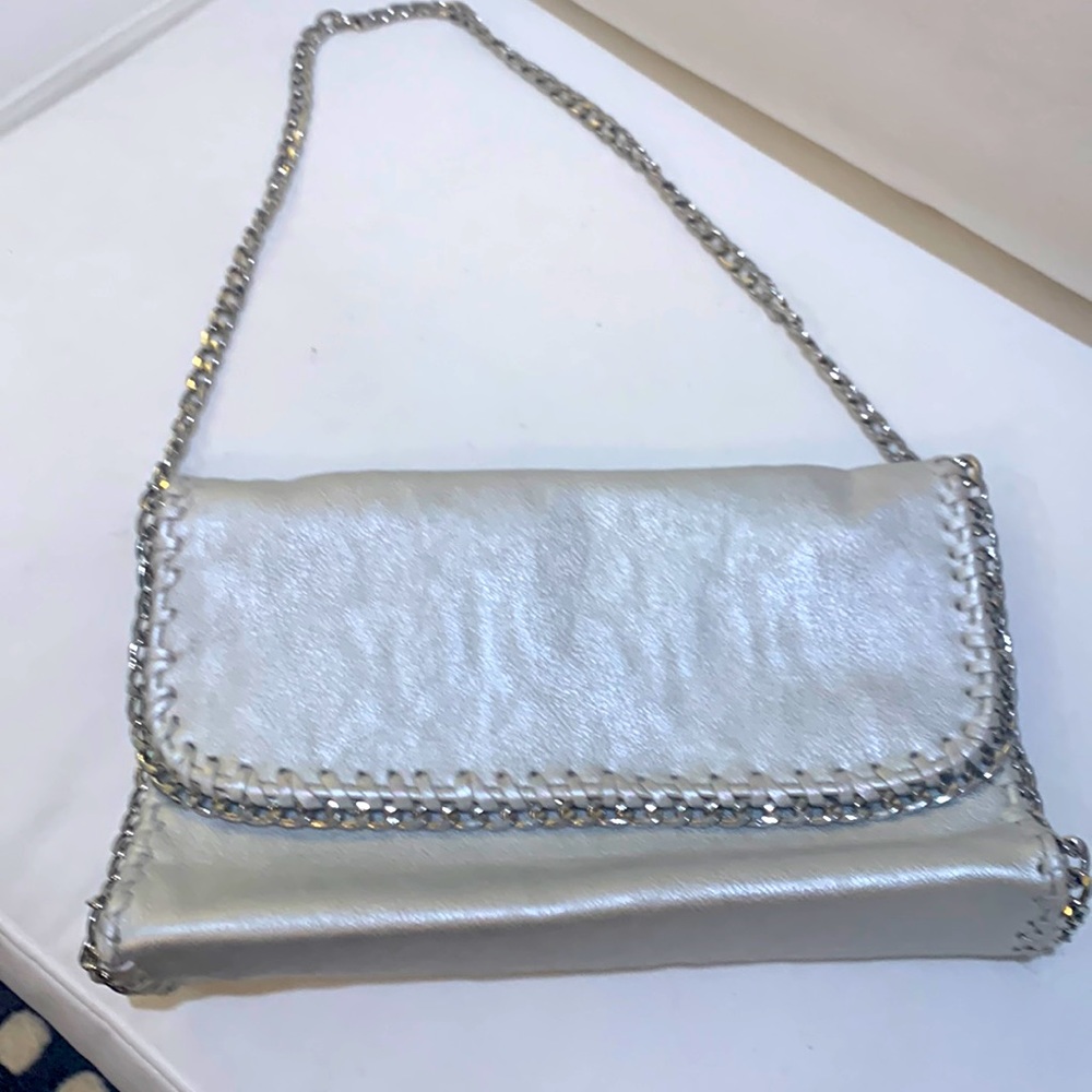 Silver purse , with removable chain so can be used as clutch also
